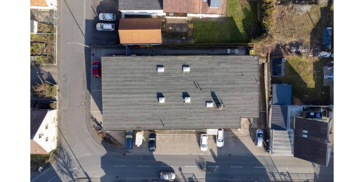 Vermietete Gewerbeimmobilie in Rottendorf zimmer