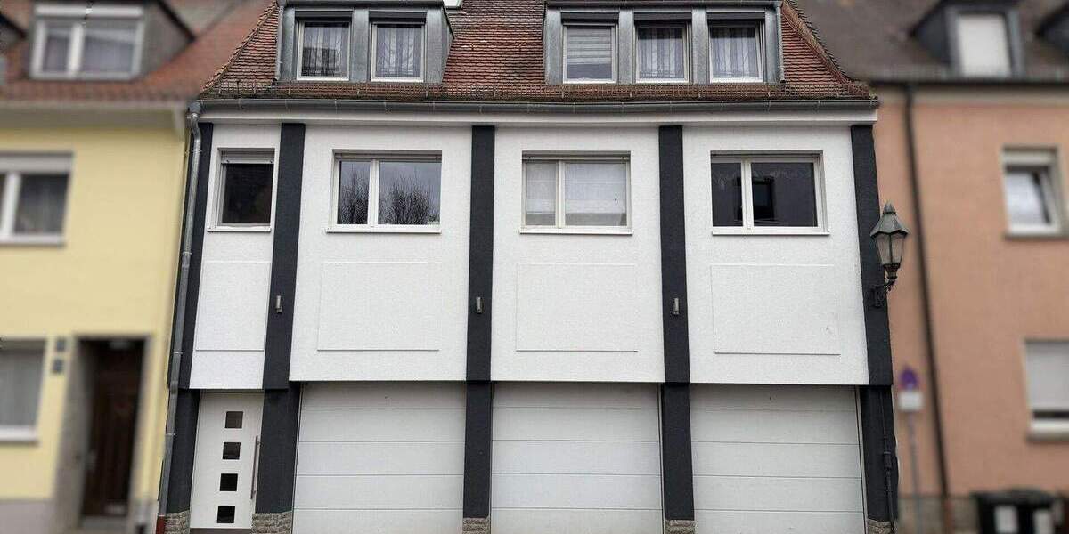 Gepflegtes Mehrfamilienhaus mit 3 Wohnungen zum Kauf in Würzburg-Heidingsfeld 8 zimmer