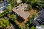Großzügiger Flachdachbungalow mit 6-Zimmern und Garten in Gerbrunn