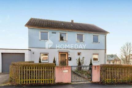 Familienfreundliches Einfamilienhaus mit 7 Zimmern und zwei Garagen in Gaibach 7 zimmer