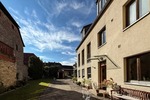 Traumhaftes Ensemble: Energieeffizientes (A) Einfamilienhaus mit Büro, großem Innenhof & Garten - Mehrfamilienhaus, Wohnhaus Fahr Fahr | Angebot:25907599