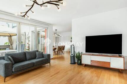 Rückzugsort mit Freiraum: 5-Zimmer-Wohnung mit Garten und Garage
