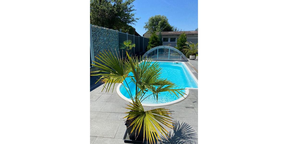 Wunderschöne EG-Wohnung - exklusiver Pool, Kamin & großem Garten 5.5 zimmer