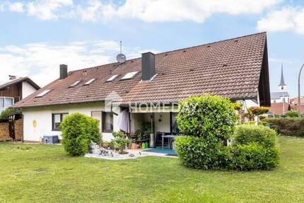 Viel Raum für Ihre Familie: Großzügiges Zweifamilienhaus mit Gartenparadies